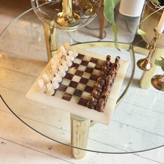 Vintage onyx marmeren schaakspel rood wit