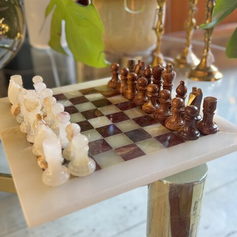 Vintage onyx marmeren schaakspel rood wit