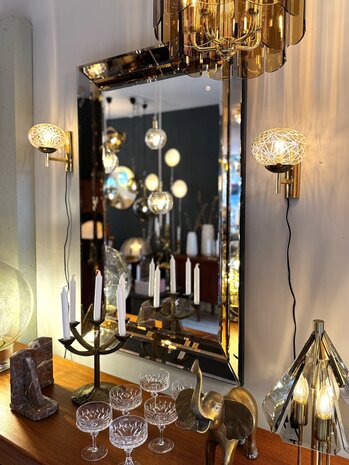 Vintage messing wandlamp met amberkleurige bol | Sprinkelhop